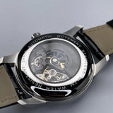 Grüne skelettierte mechanische Uhr mit Lederarmband