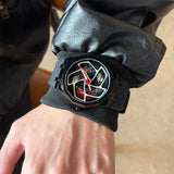 Schwarze Vortex-Uhr mit drehbarem Zifferblatt