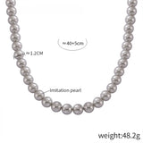 قلادة رمادية مستديرة من الفولاذ المقاوم للصدأ