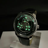 Grüne skelettierte mechanische Uhr mit Lederarmband