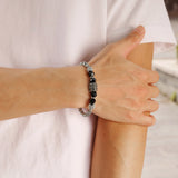 Pulsera con cabeza de calavera y cruz gótica