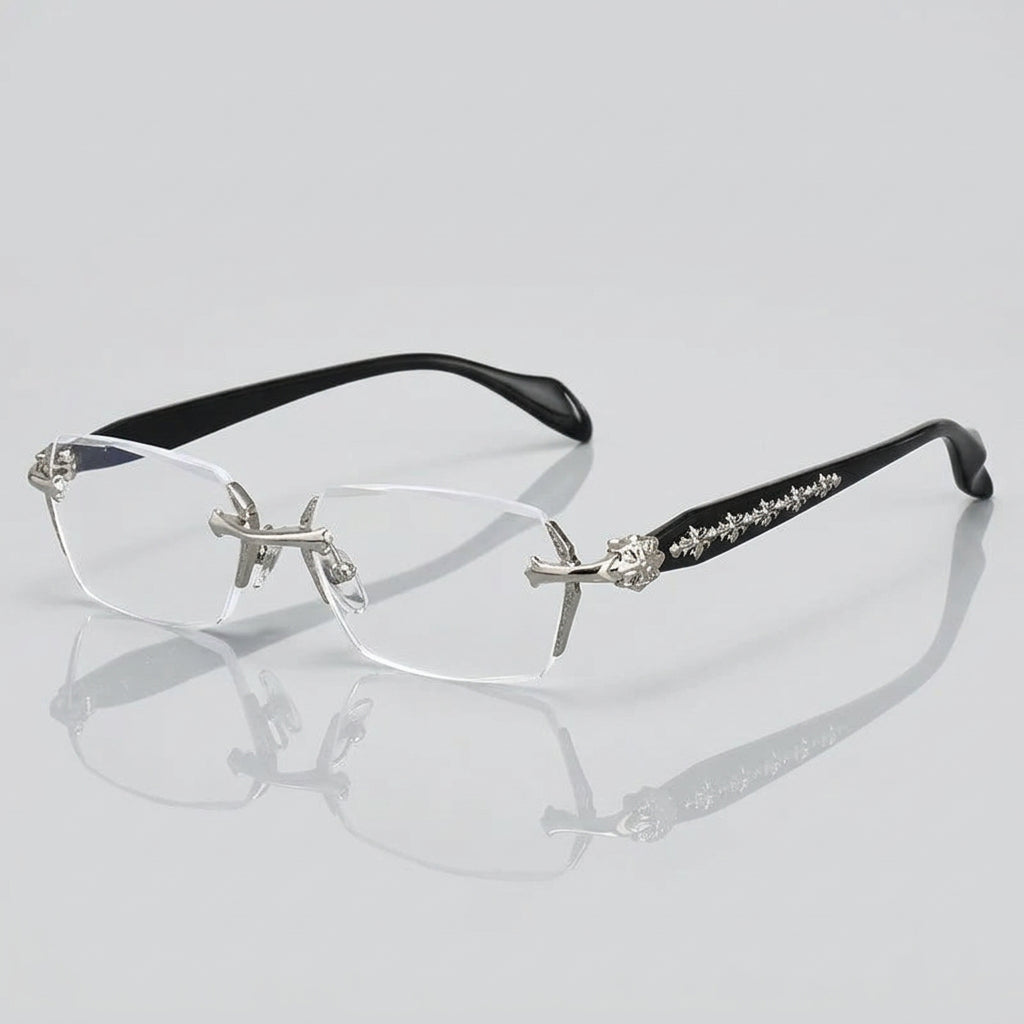 Pair of eyeglasses with decorative black arms on a reflective surface.