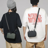 Sac à bandoulière solide en PVC à boîte rayée