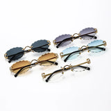 Irregular Cut Oval Rimless Sunglasses