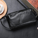 Leaves Embossed Genuine Leather Clutch Bag