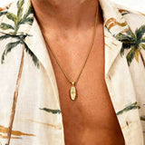 Collar pequeño de cocotero con tabla de surf