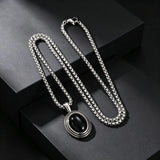 Collier pendentif ovale en pierre noire pour hommes