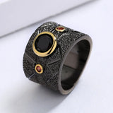 Bague noire de mosaïque géométrique