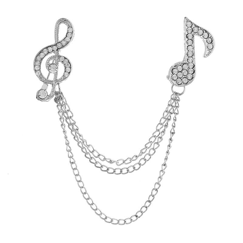 Broche de cadena de aleación con símbolo de música de diamantes de imitación