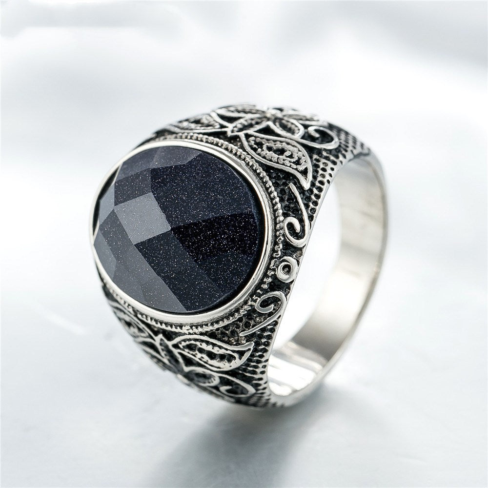 Anillo de piedra preciosa negra tallada floral