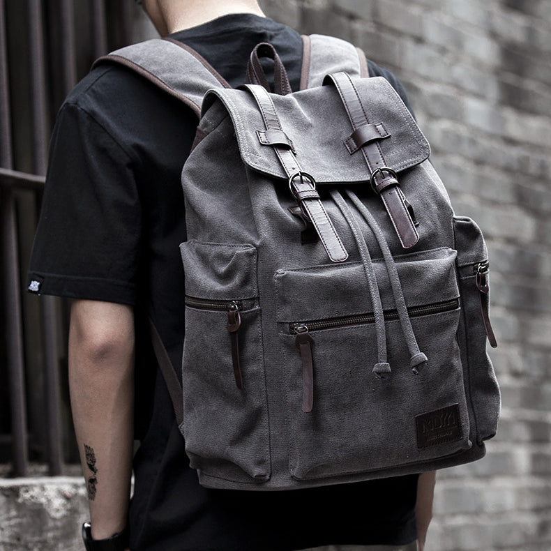 Triple Pockle Shock Dropstring Closure Backpack