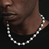 Collier de perles noir et blanc