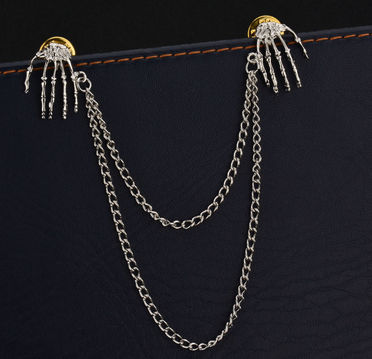 Broche de cadena de esqueleto de mano