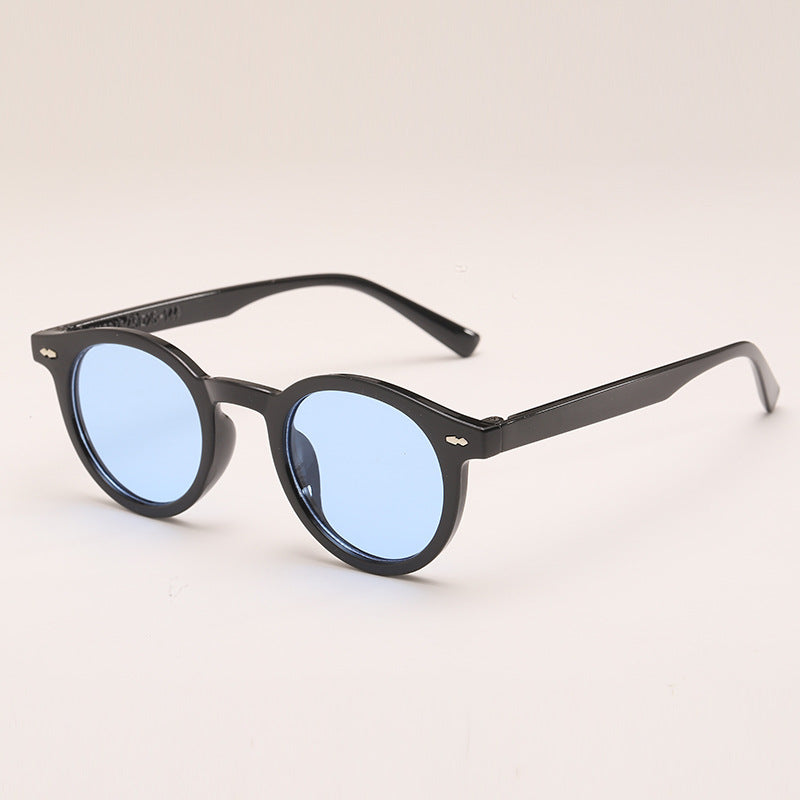 Lunettes de soleil de couleur unie ronde à la mode