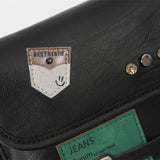 Patchwork Rivet Decorated PU Leather Sling Bag