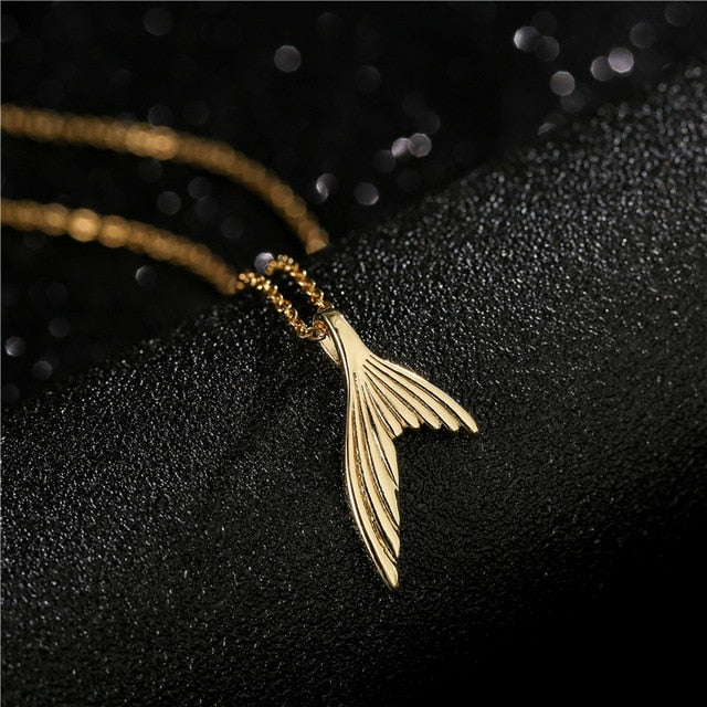 Collar con colgante de cobre con diente de lobo