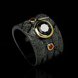 Bague noire de mosaïque géométrique