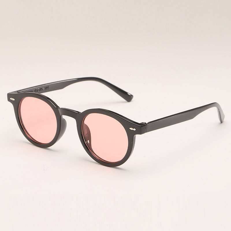 Lunettes de soleil de couleur unie ronde à la mode